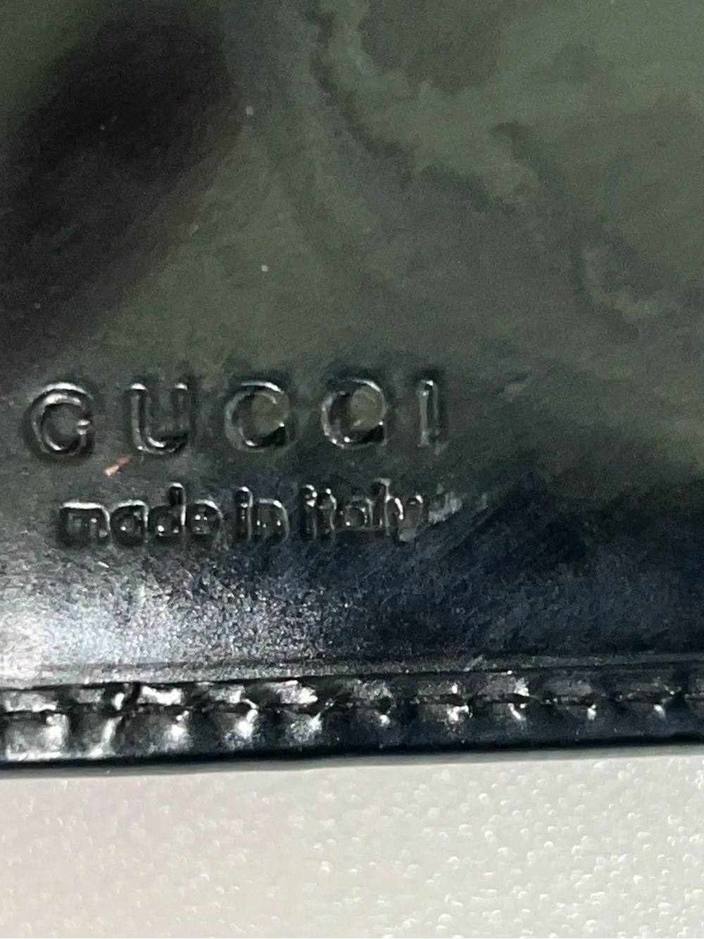 Gucci Black Patent Leather Bi-Fold Wallet with Embossed G